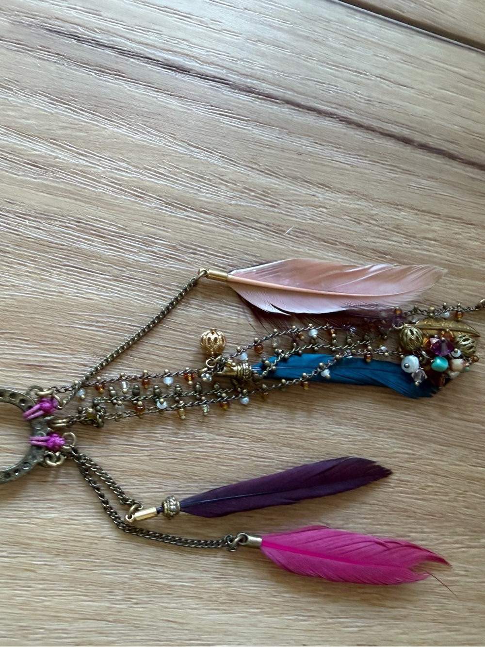 Gas Bijoux Feather Charm Necklace in Pink, Purple, Teal, and Peach